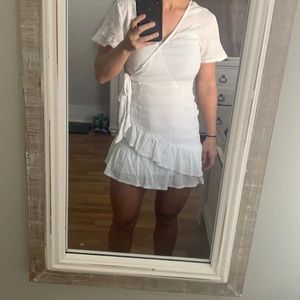 SOLD Polly White linen wrap dress with ruffle bottom